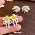 White Floral Dangle Stud Earrings in Two Daisy Styles view 2