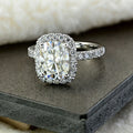 Oval Clear Solitaire Halo Ring In Polished Silver Tone view 1