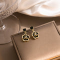 Black Heart and Camellia Flower Clear Look Drop Earrings view 3