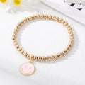 Gold Tone Beaded Smiley Butterfly Unicorn and Rainbow Bracelets view 3