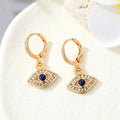 Gold Tone Ornate Evil Eye Medallion Huggie Earrings in Eight Designs view 10