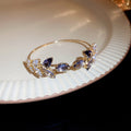 Gold Tone Leaf Crystal Open Bangle In Clear Pink Or Purple view 8