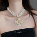 Multistrand Shell Bead and Ornate Cross Pendant Necklace view 1