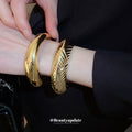 Seventeen Repeated Gold Or Silver Sculptural Open Cuff Designs view 2