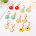 Gold Tone Round Daisy Resin Huggie Drop Earrings in Six Colors view 1