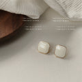 Gold Tone Rounded Square Stud Earrings In White And Burgundy view 6