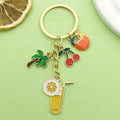 Gold-Tone Fruit And Drink Charm Keychain With Palm Tree And Cherries view 3