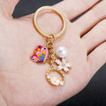 Pink Butterfly Pearl and Open Flower Enamel Charm Keychain view 3