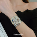 Two Mixed Gold Tone Wide Open Cuffs With Sculpted Flowers Or Leaves view 3