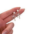 Pearl Bow Stud Earrings with Delicate Short Chain Tassels view 5