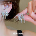 Crystal Bow and Planet Motif Stud Earrings in Three Designs view 4