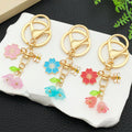 Blossom Bee Butterfly Shell and Bell Flower Keychains view 3