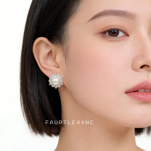 Model wearing silver pearl stud with clear CZ halo