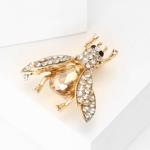 Bee brooch close-up showing teardrop abdomen and wings