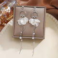 White Petal Flower Pearl Look Silver Chain Dangle Earrings view 3