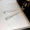 Gold Tone Long Chain White Teardrop Pearl Drop Earrings view 4