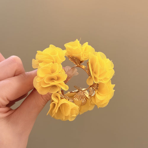 Fabric Flower Hoop Earrings in Yellow and Aqua shown as a complete design
