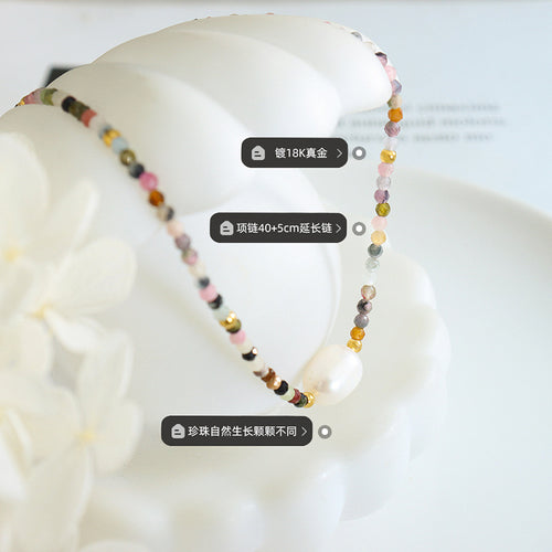 Multicolor bead pearl necklace on display with plating and size labels