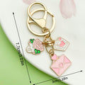 Flower Charm Keychains Featuring Pink Heart Across 35 Pictured Variations view 3