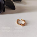 Crossed Open Rings In Polished Silver And Gold Tone view 7