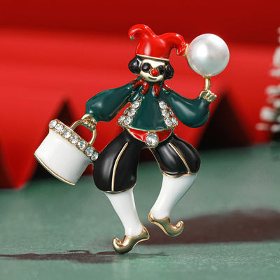 Front view of playful jester holding a white pearl-like ball and a small drum