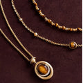 Gold Tone Round Brown Stone Layered Pendant Necklace view 4