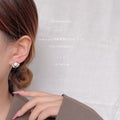 Gold Tone Clear Stone Halo Large White Pearl Stud Earrings view 2