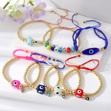 Gold Tone Beaded Cord Bracelets with Colorful Eye Center Beads