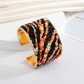 Gold Tone Seed Bead Animal Pattern Wide Cuff Bracelets in Six Designs view 6