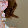 Iridescent Crystal Heart Drop Earrings in Gold Tone view 3