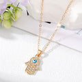 Gold and Silver Tone Crystal Evil Eye and Hamsa Necklaces view 4