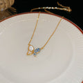 Gold Butterfly Mother of Pearl Blue Crystal Necklace view 6