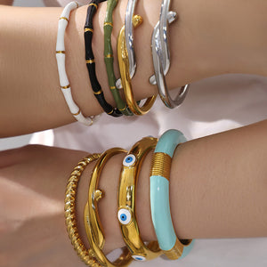 Bamboo and Geometric Bangle Collection in Mixed Metal Tones