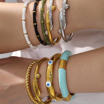 Bamboo and Geometric Bangle Collection in Mixed Metal Tones