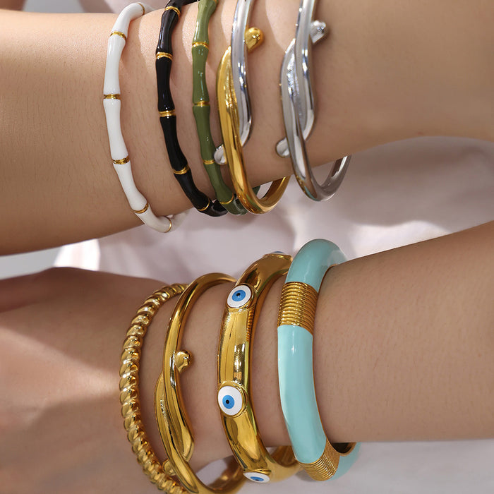 Bamboo and Geometric Bangle Collection in Mixed Metal Tones
