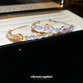 Pink Round Center And Clear Marquise Crystal Cuff In Gold Or Silver Tone view 2