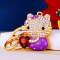 Jeweled Bow Cat Keychains Holding Heart-Shaped Gems in Four Colors view 4