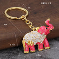 Metal Elephant and Dragon Fang Keychains in Eight Styles view 2