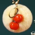 Twin Persimmon Plush Pom Keychains in Fifteen Listed Loop Colors view 9