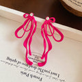 Colorful Cord Bow Stud Earrings with Long Looped Ribbon Tails view 6