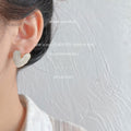 White Glossy Heart Stud Earrings Gold Tone Rim Butterfly Backs view 2