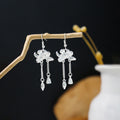 Eighty-Two Silver Tone Ethnic Fringe and Tassel Earrings view 11