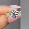 Round Clear Solitaire Bow-Detail Ring In Polished Gold Tone view 3