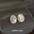 Gold Tone Clear Oval Faceted Stone Double Halo Stud Earrings view 4