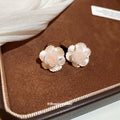 Ivory Resin Flower Stud Earrings With Gold Tone Centers view 3
