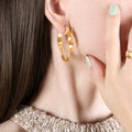 Twisted Geometric Open Hoop Earrings Gold And Steel Finish view 3