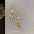 Gold Leaf Dangle Earrings White Pearl Fishhook Ear Wires view 1
