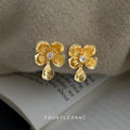 Gold Textured Flower Drop Earrings With Clear Center Stone view 3