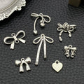 Black Bow and Butterfly Metal Charms with 13 Listed Options view 3