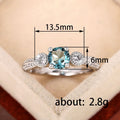 Aqua Round Three-Stone Pave Ring In Polished Silver Tone view 4